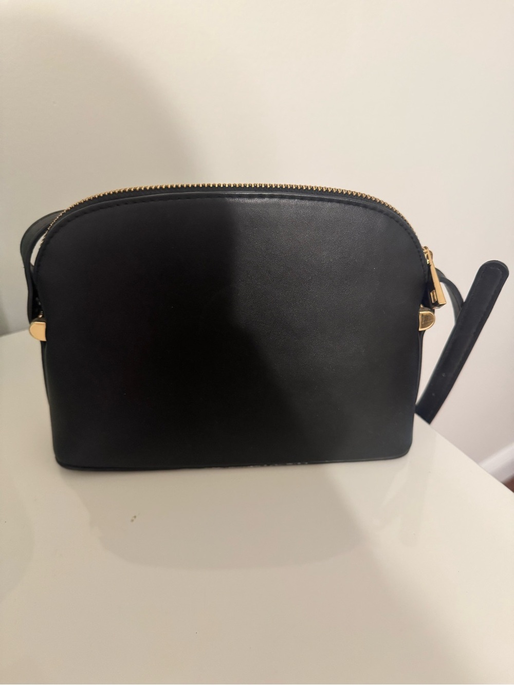 Classic Black Leather Crossbody Bag with Gold Hardware